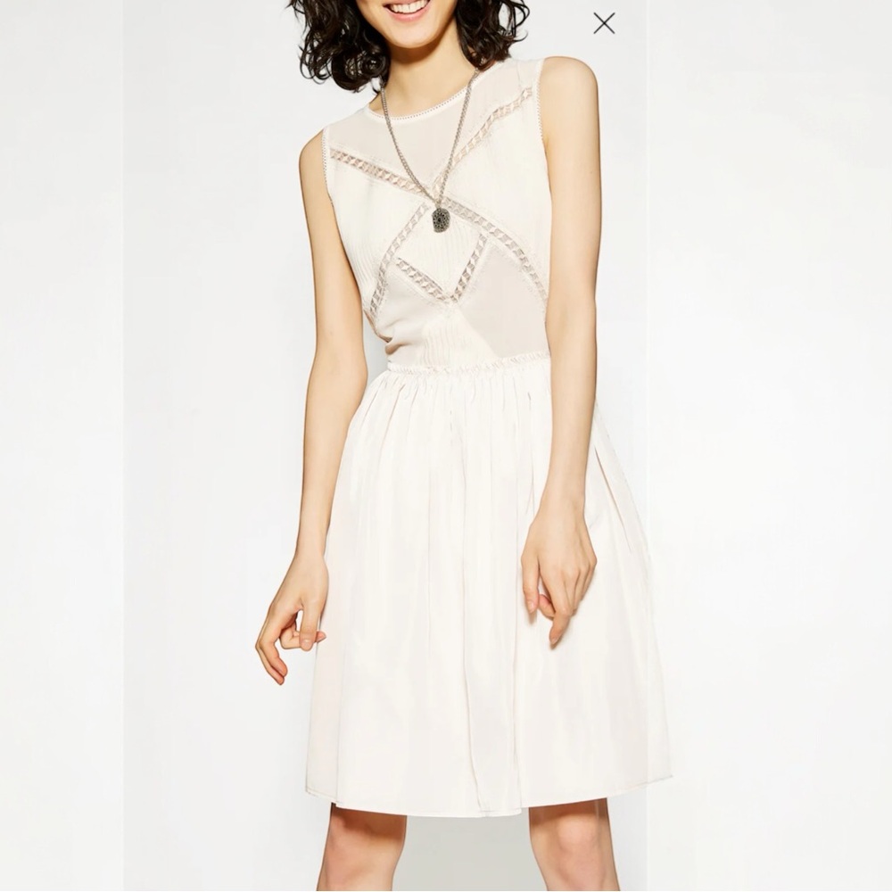 Designer Women’s Dress By THE KOOPLES. NWT size Small